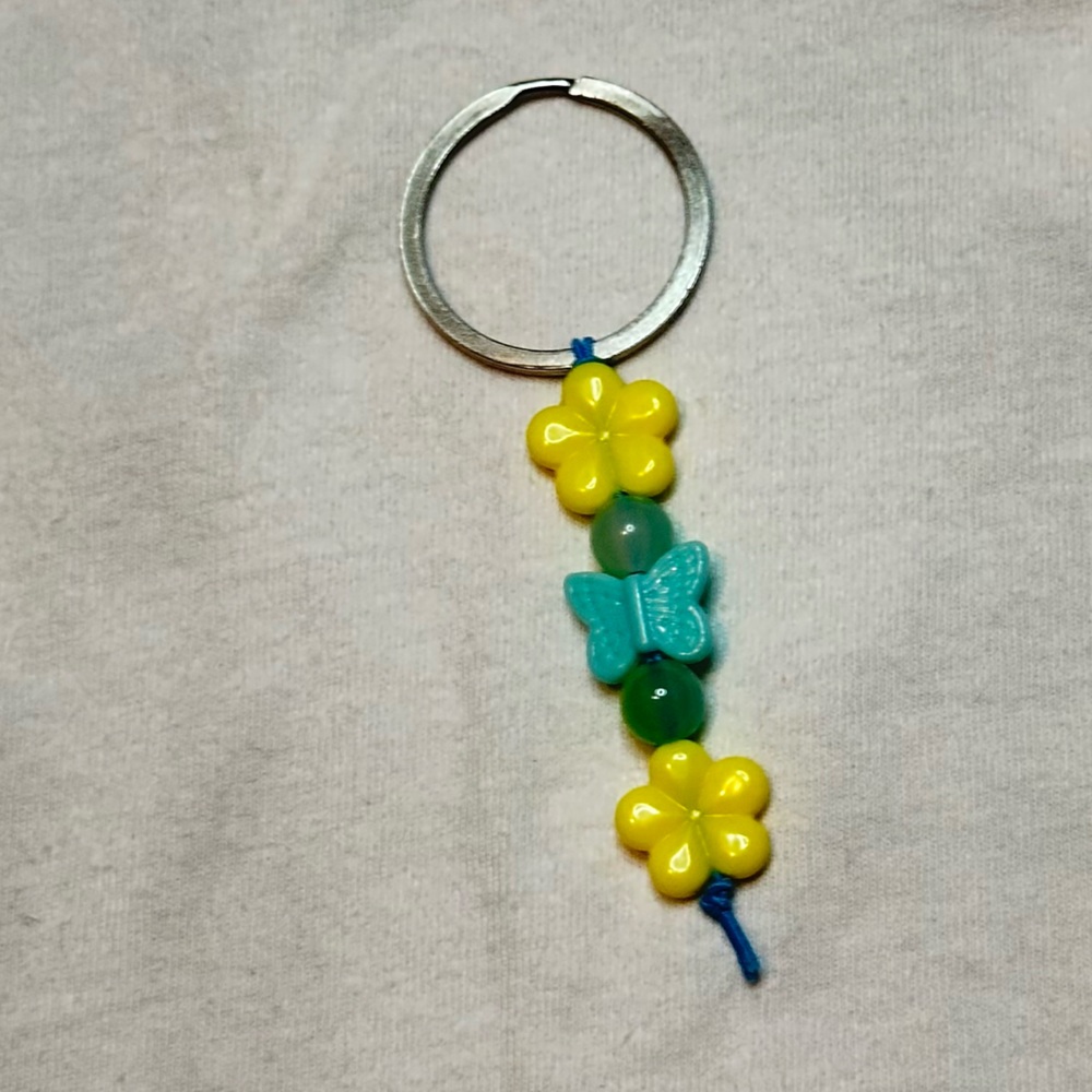 Handmade maryposa Flower key chain blue butterfly and yellow flower 🦋